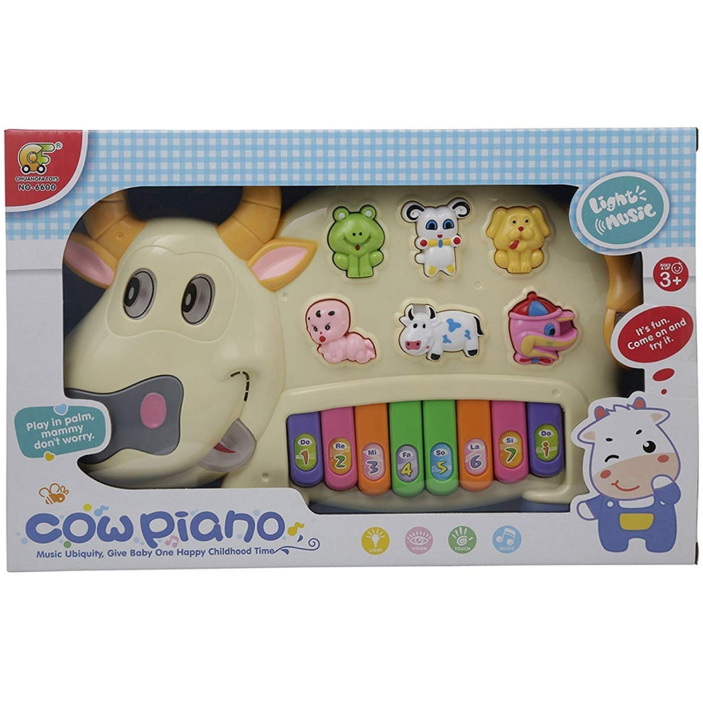 Cow best sale piano toy